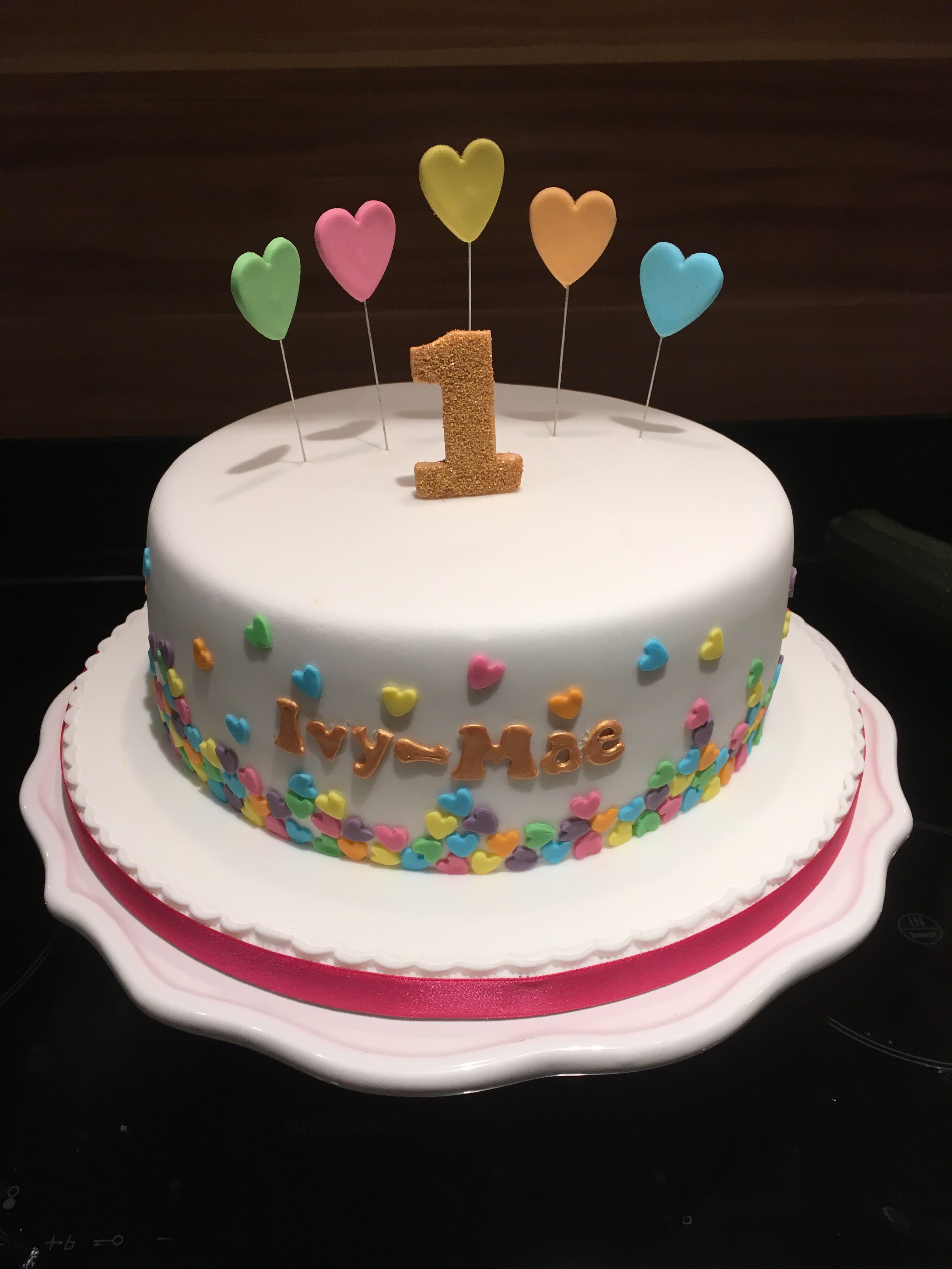 Cute hearts 1st birthday cake